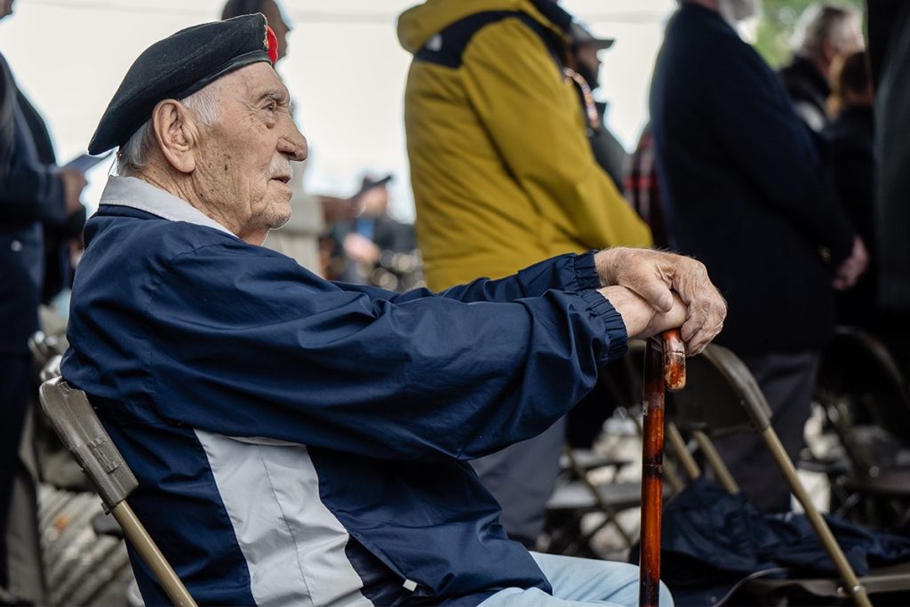 A veteran sits watching the Remembrance Day ceremony in Nanaimo on Nov. 11, 2024. 