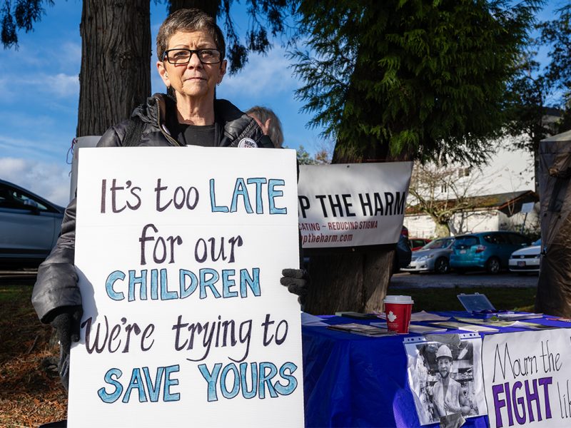 Sue Fichtler lost her son Evan to a fatal overdose in 2022. She was at the opening of a pop-up overdose prevention site across the street from the Nanaimo Regional General Hospital with Moms Stop the Harm on Monday, Nov. 18, 2024 to call for more services for people who use drugs. Photo by Mick Sweetman / The Discourse.