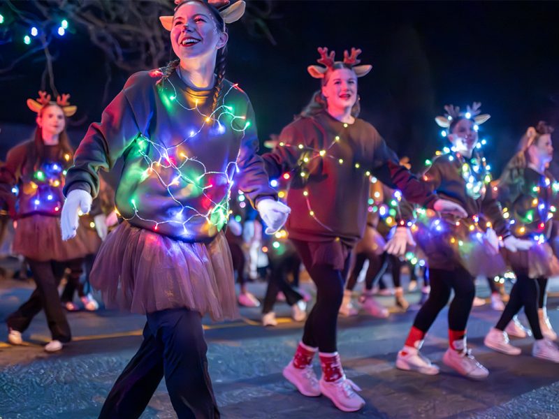 Dancers from the Rhythm Dance Academy in Ladysmith wearing reindeer horns and lights took to the streets show off some festive routines .