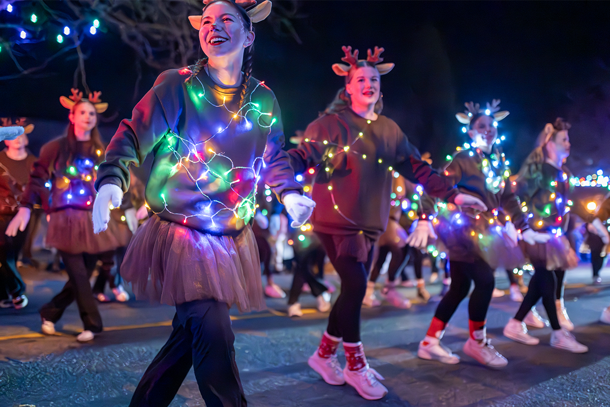 Dancers from the Rhythm Dance Academy in Ladysmith wearing reindeer horns and lights took to the streets show off some festive routines .