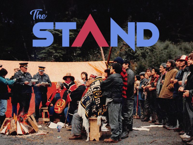 Poster for The Stand showing people from the Haida nation blocking a road.