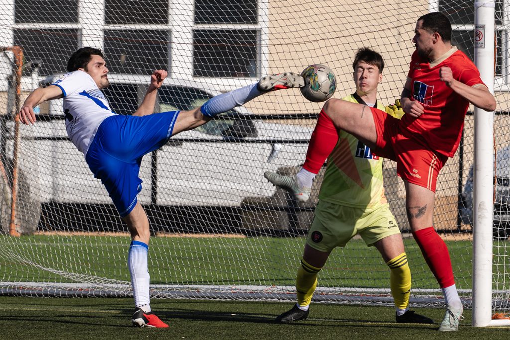Nanaimo United FC defender Matthew McConnach blocks a shot on goal by an Evolution FC player on April 12, 2025.