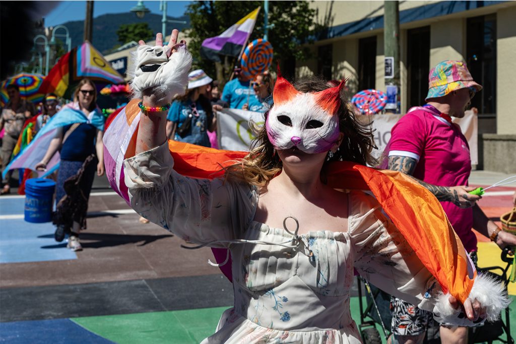 A Furry high-fives at the Nanaimo Pride Parade on Sunday, June 8, 2025.