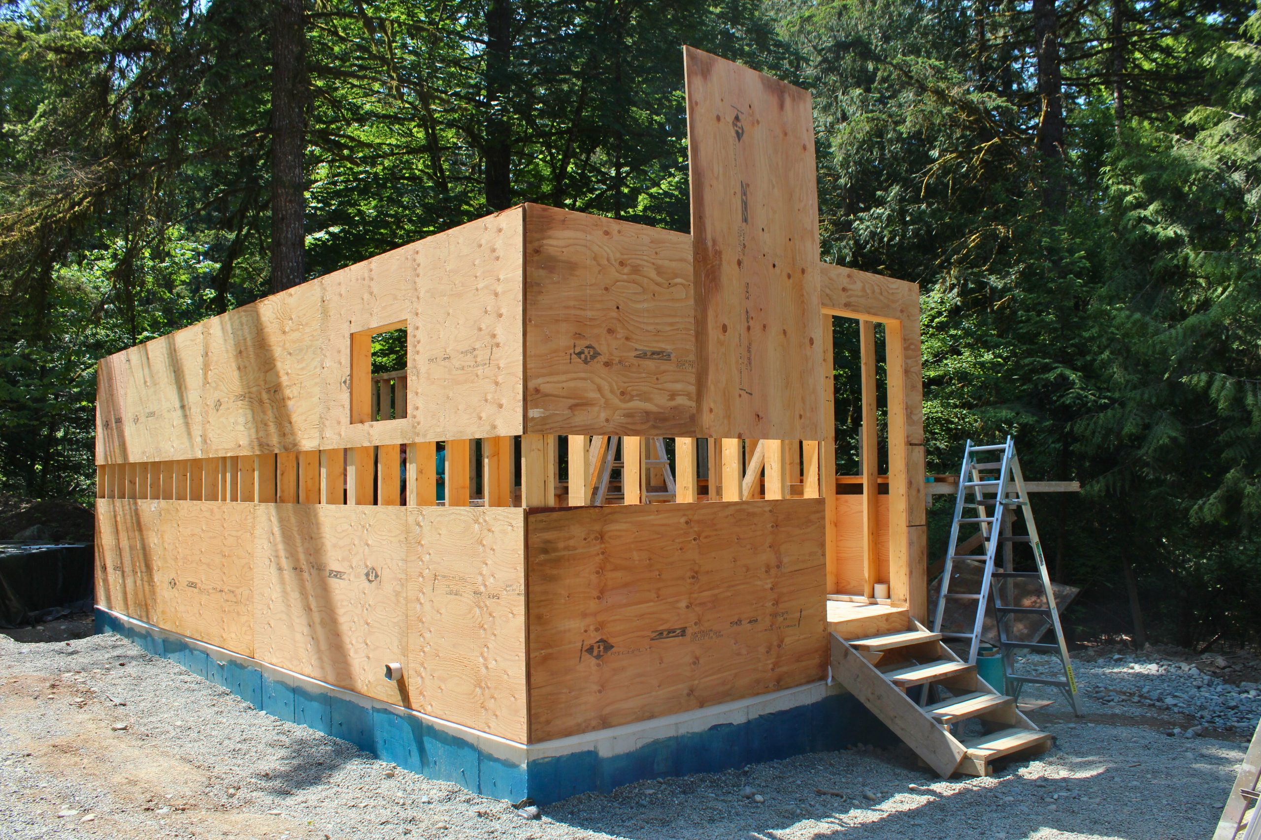 A wooden Frame of a building that will become a processing facility for traditionally prepared Indigenous food.