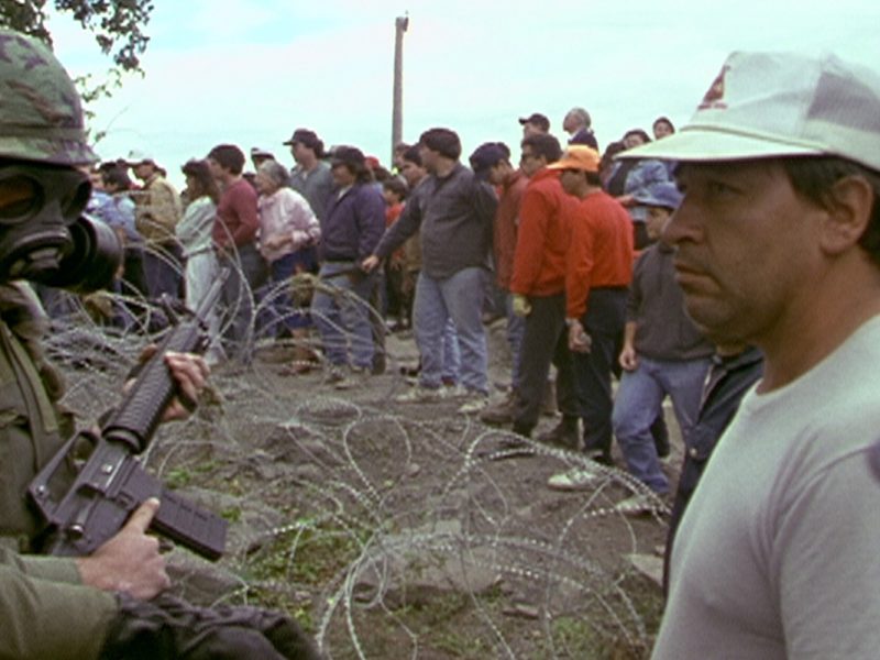 Indigenous activists confront armed soldiers in the movie Rocks at Whiskey Trench.