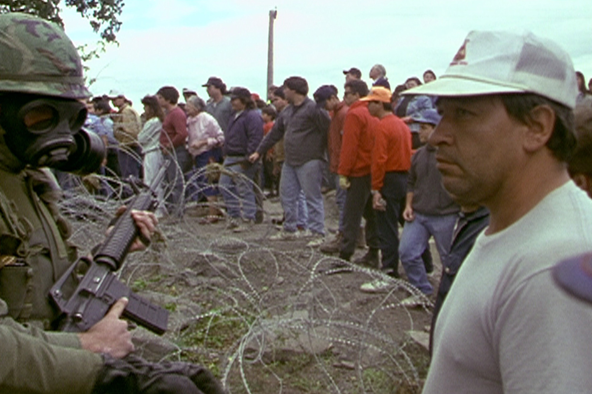 Indigenous activists confront armed soldiers in the movie Rocks at Whiskey Trench.