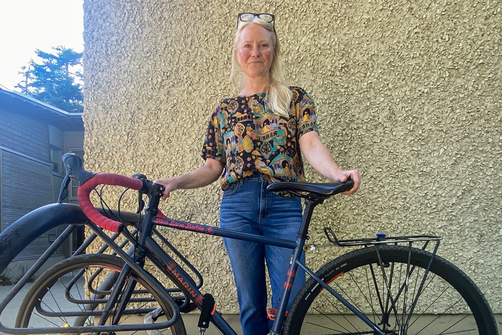 Nanaimo city councillor Erin Hemmens poses with her bike with the “Bike Lane Barbie” sticker.