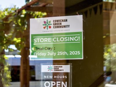 A sign in a window outlining the closing date of the reFRESH Marketplace.