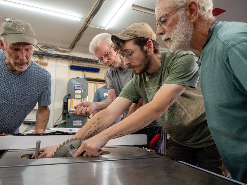 Members of Makerspace Nanaimo receive training on a new, safe table saw that automatically shuts down if it senses a finger too close to the blade.
