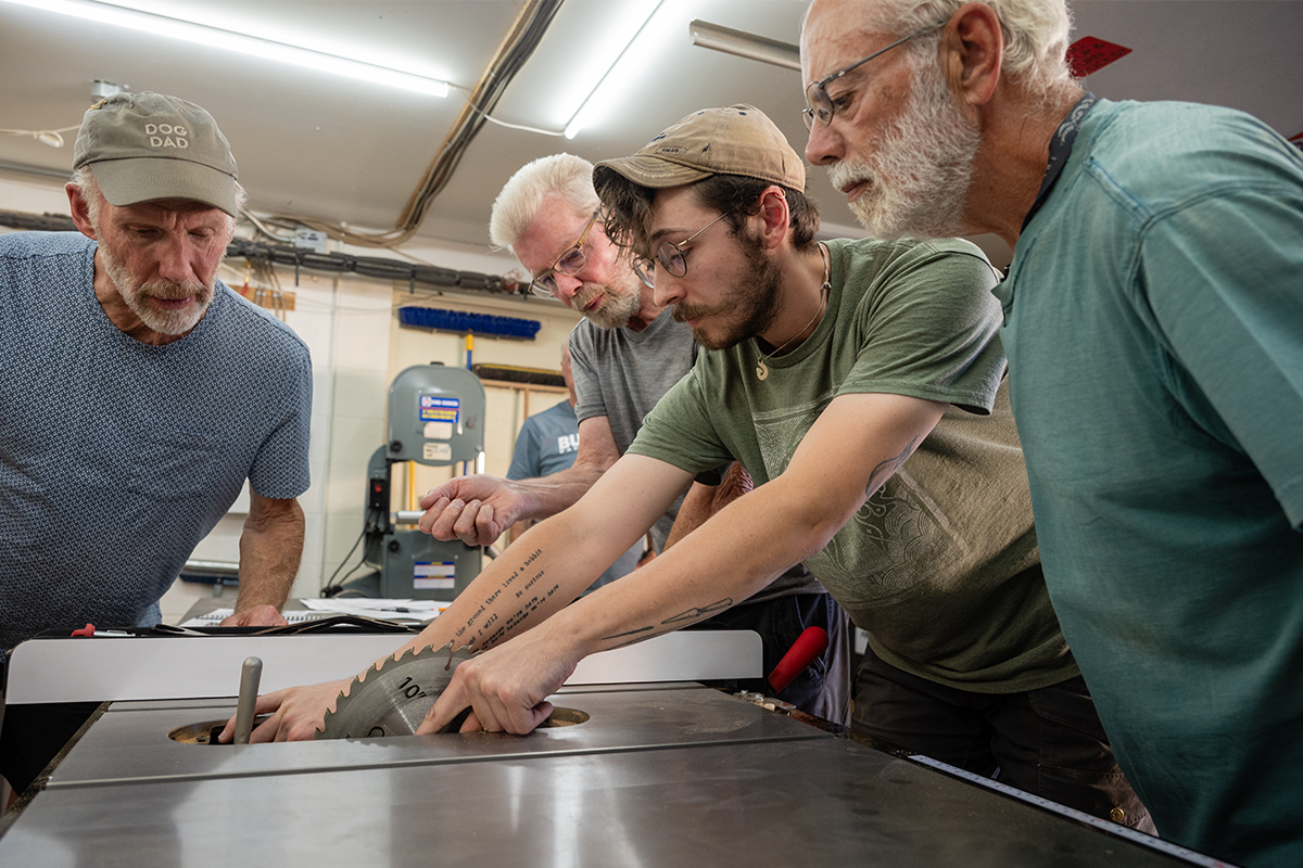 Members of Makerspace Nanaimo receive training on a new, safe table saw that automatically shuts down if it senses a finger too close to the blade.