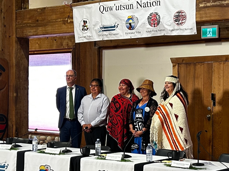 Four Leaders from the Quw’utsun Nation stand with their legal counsel at a press conference announcing the court win.