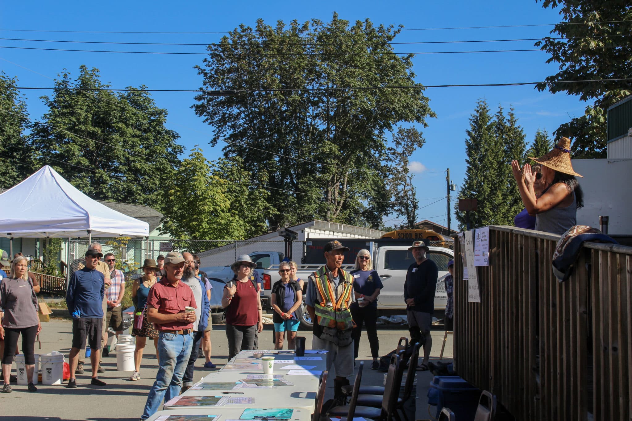 Volunteers listened to Chief Xtli’liye (Lydia Hwitsum) welcome them to Cowichan Tribes Land.