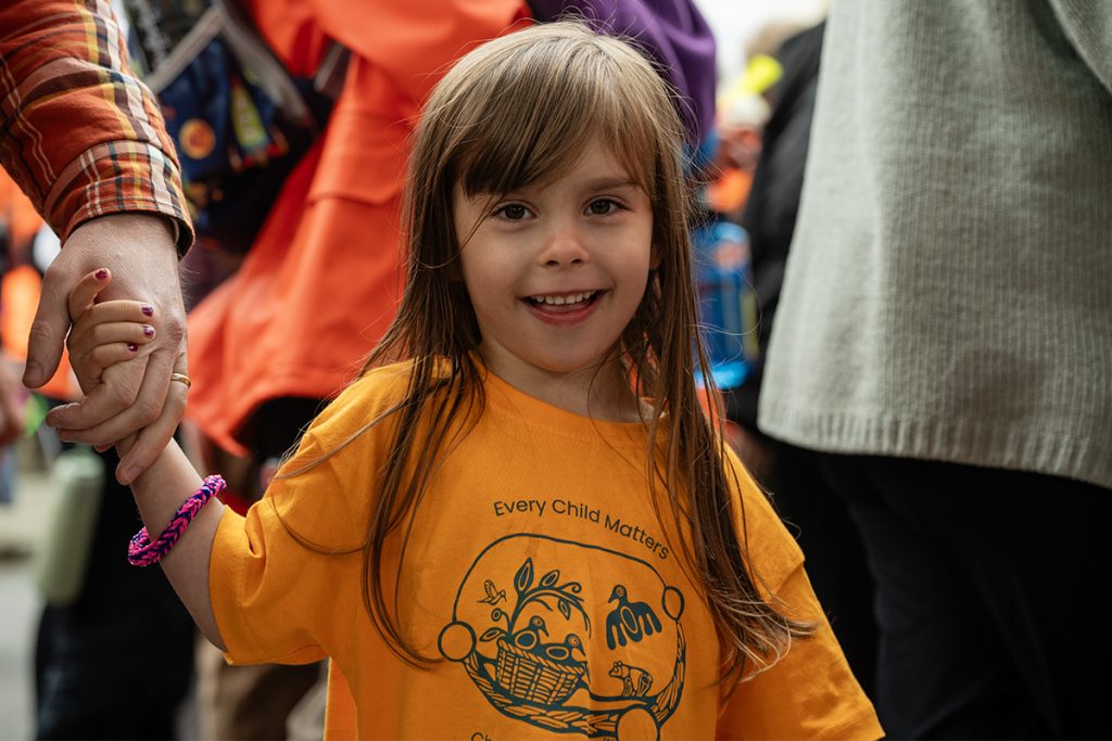 A child wearing an orange shirt participates in the Every Child Matter march in Duncan on Sept. 30, 2025.