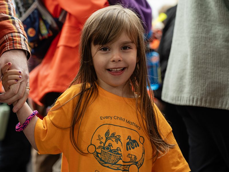A child wearing an orange shirt participates in the Every Child Matter march in Duncan on Sept. 30, 2025.