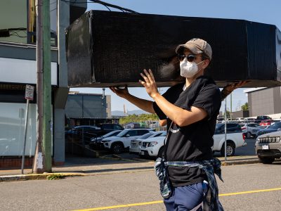 Activists carry a mock coffin at the march for International Overdose Awareness Day in Nanaimo on Aug. 29, 2025. Photo by Mick Sweetman / The Discourse.