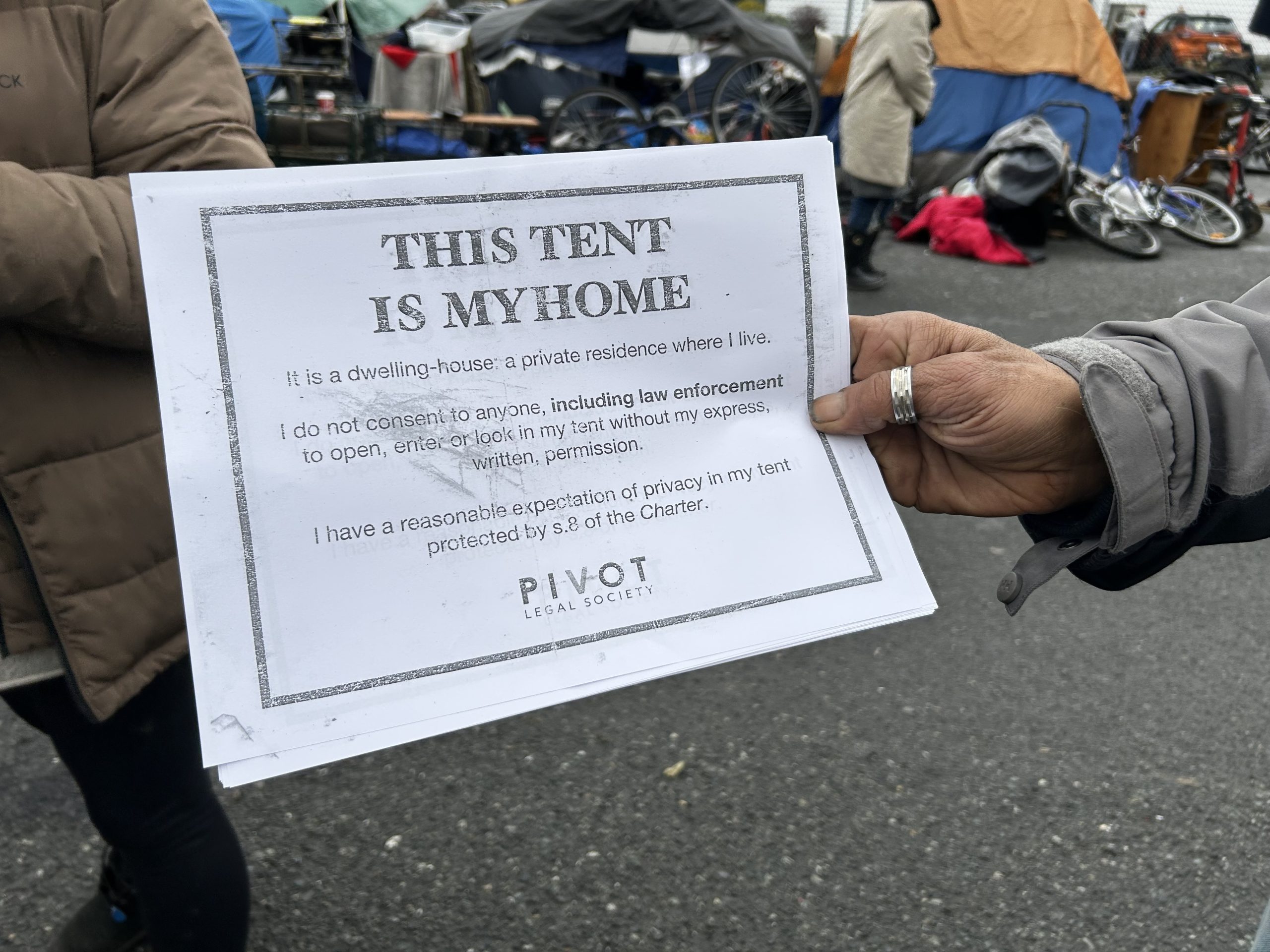 Residents of the Lewis Street Encampment used this sign to remind law enforecement of their right to privacy.