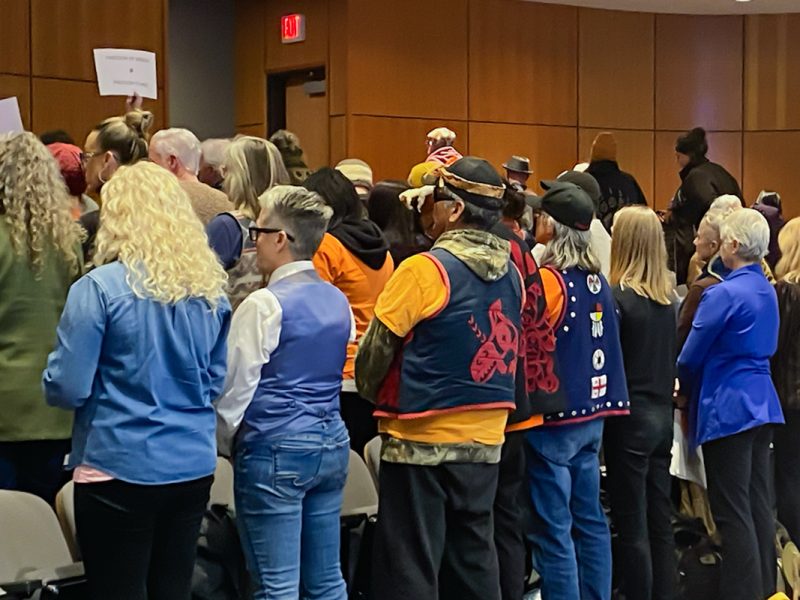 People in the gallery turned their backs on Mayor Leonard Krog at the Nanaimo city council meeting in a silent protest after he said he would not support asking The Port Theatre to review its booking policy in response to outrage comedian Ben Bankas performing there next month. Photo by Mick Sweetman / The Discourse.