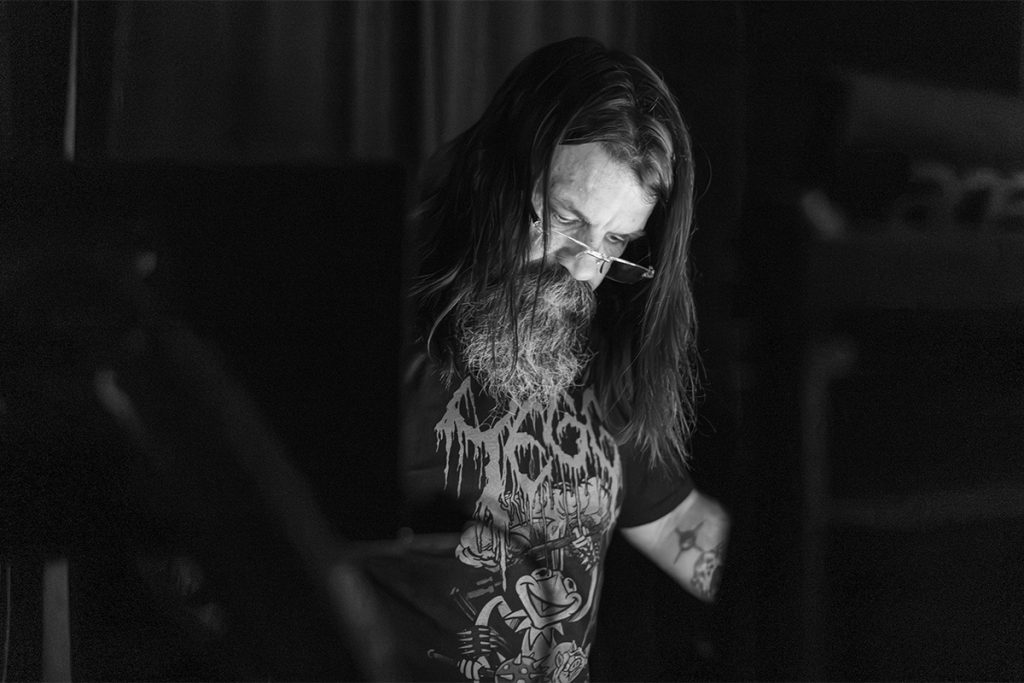 The Globe’s owner Richard Scott works the sound booth during a show on March 27, 2026. 

