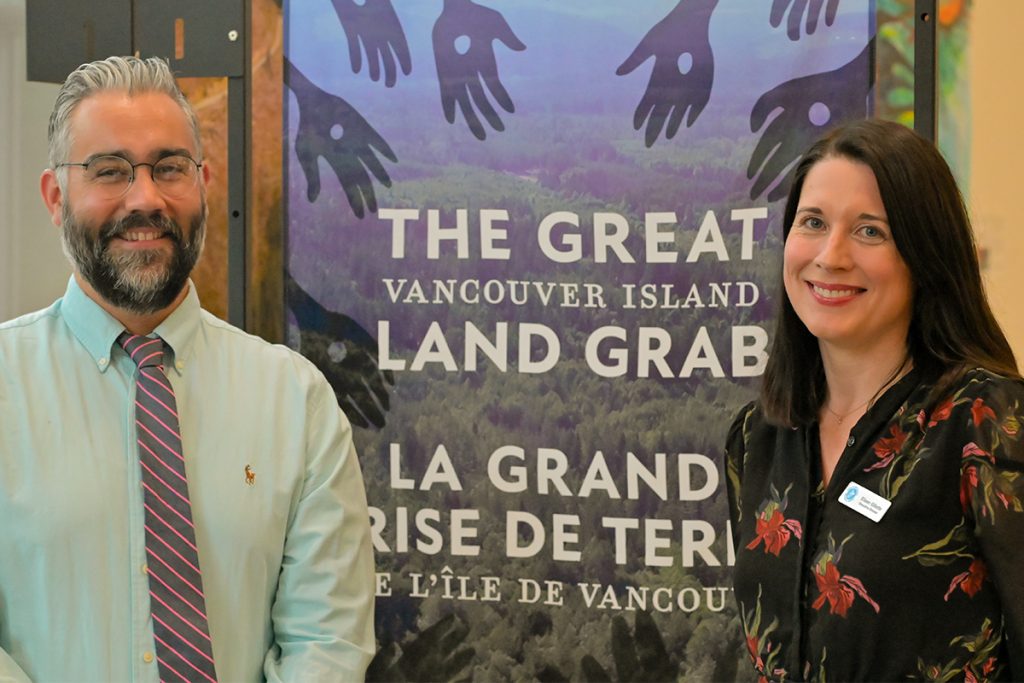Kelly Black, president of the Vancouver Island Local History Society and Eileen Gillette, executive director of the Vancouver Island Regional Library, helped bring The Great Vancouver Island Land Grab exhibit to Nanaimo’s Harbourfront library. Photo by Mick Sweetman / The Discourse.