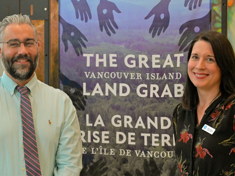 Kelly Black, president of the Vancouver Island Local History Society and Eileen Gillette, executive director of the Vancouver Island Regional Library, helped bring The Great Vancouver Island Land Grab exhibit to Nanaimo’s Harbourfront library. Photo by Mick Sweetman / The Discourse.