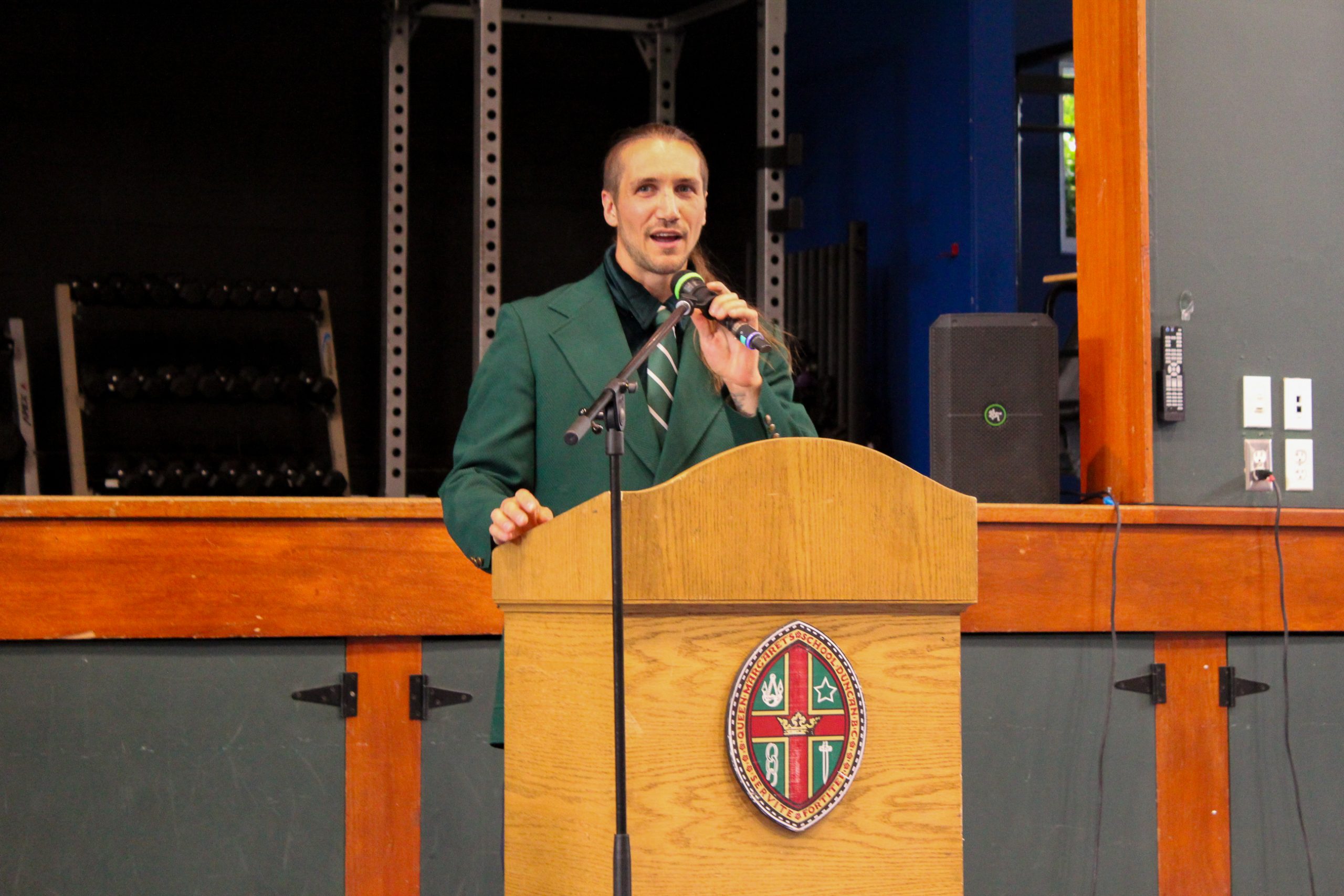 Educator Tim Sailor addresses students at the unveiling celebration.