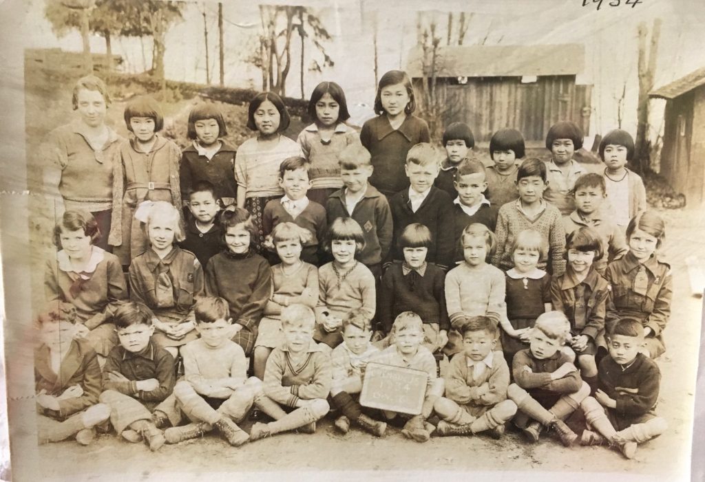 An archival photo of a school class in 1934 featured at None Came Back at the Chemainus Valley Museum.