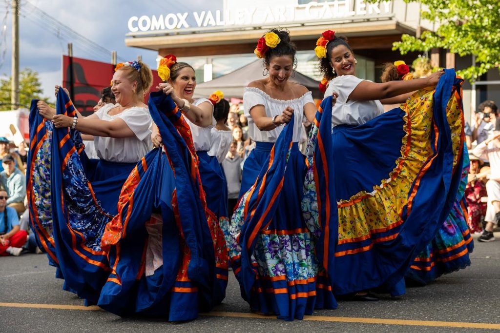 Cumbia dancers from the Raíces Mestizas Collective perform at the Pulse on the Plaza: K'omoks Fusion Festival in downtown Courtenay on June 24, 2026. Photo courtesy of Greg Rosenke.